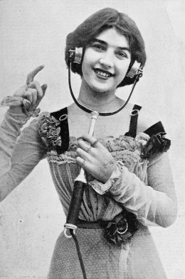 Woman demonstrating electrophone, 1901